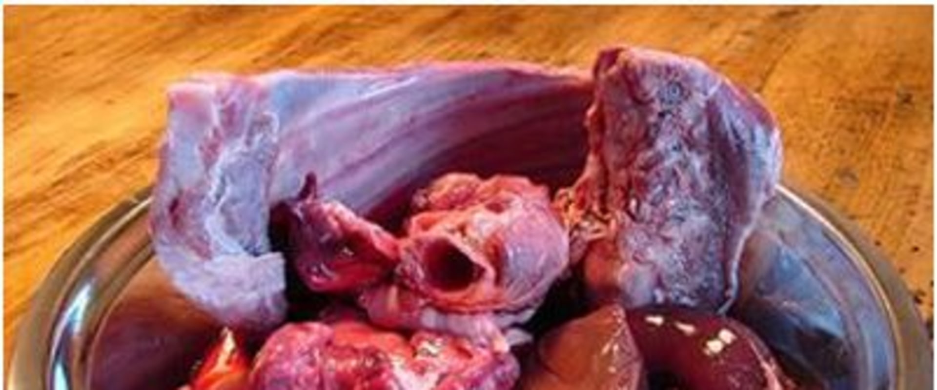 Do dogs prefer raw meat or cooked?