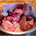 Do dogs prefer raw meat or cooked?